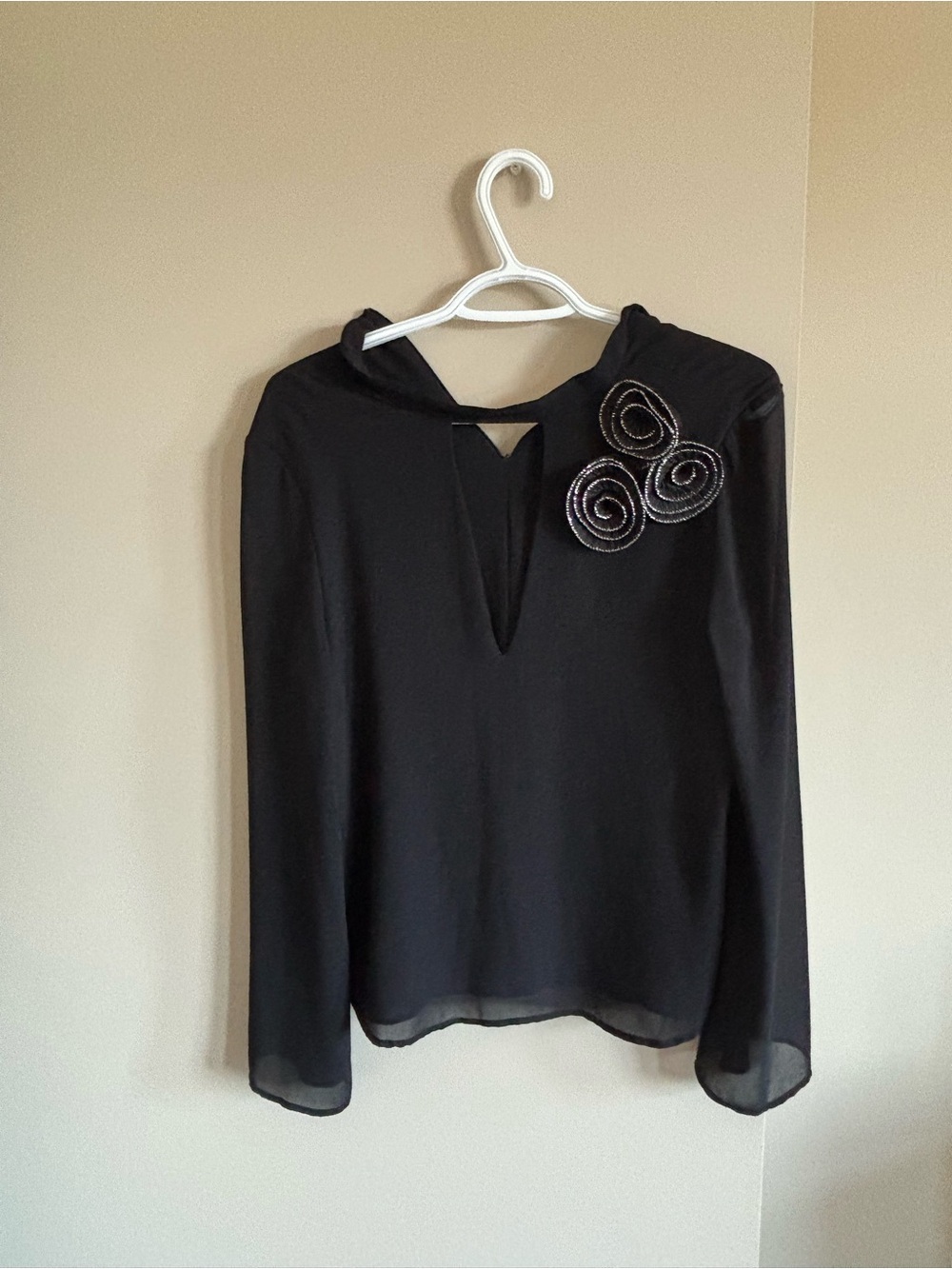 Zara Black Long-Sleeve V-Neck Blouse with Spiral Rosette Accent